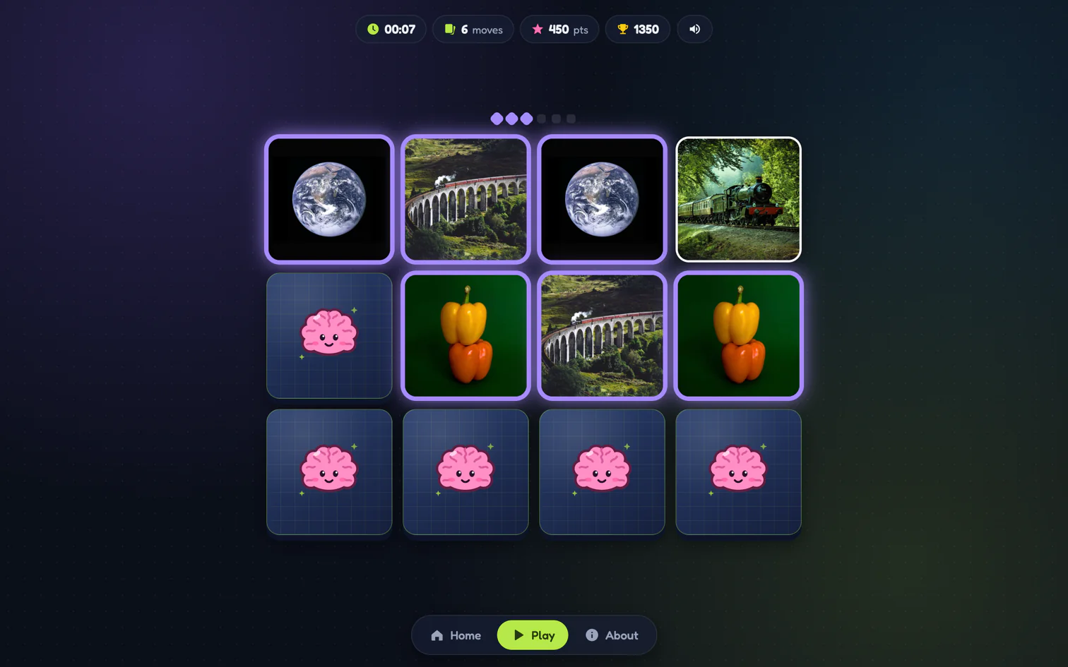 Memory game board with matched pairs glowing in their score colors